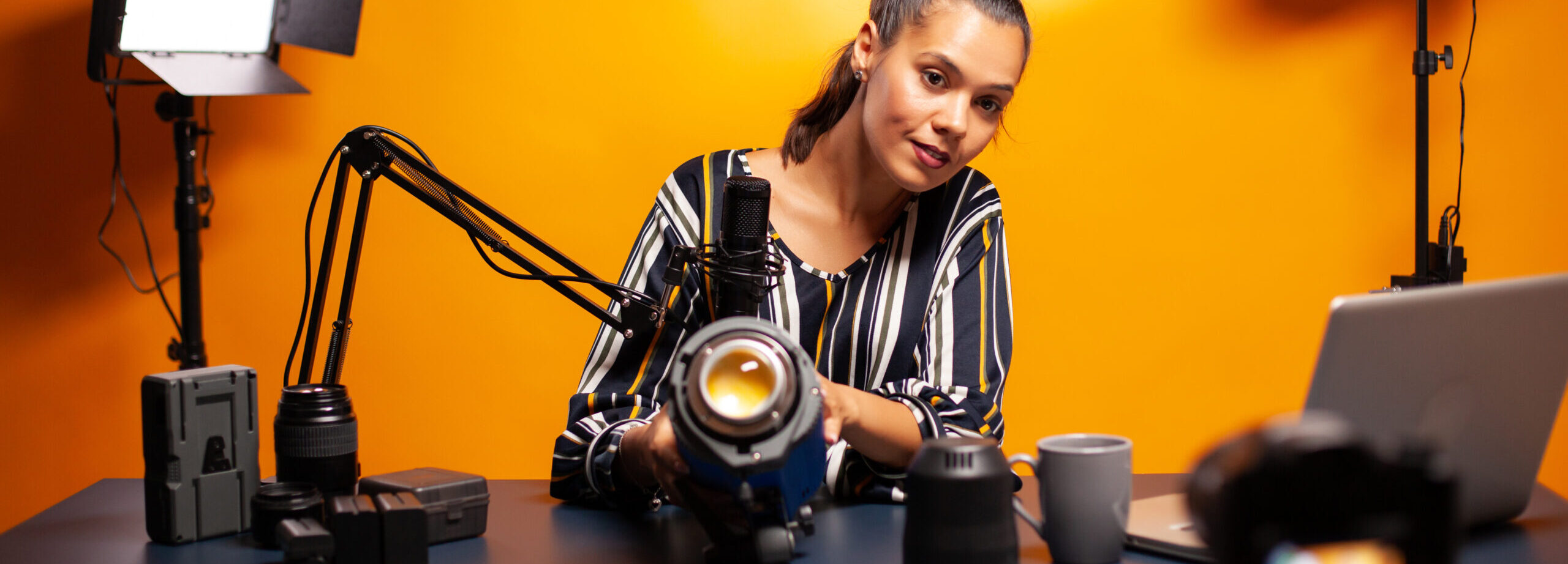 Presenting studio light for vlog production in home studio. Social media star making online internet content about video equipment for web subscribers and distribution, film